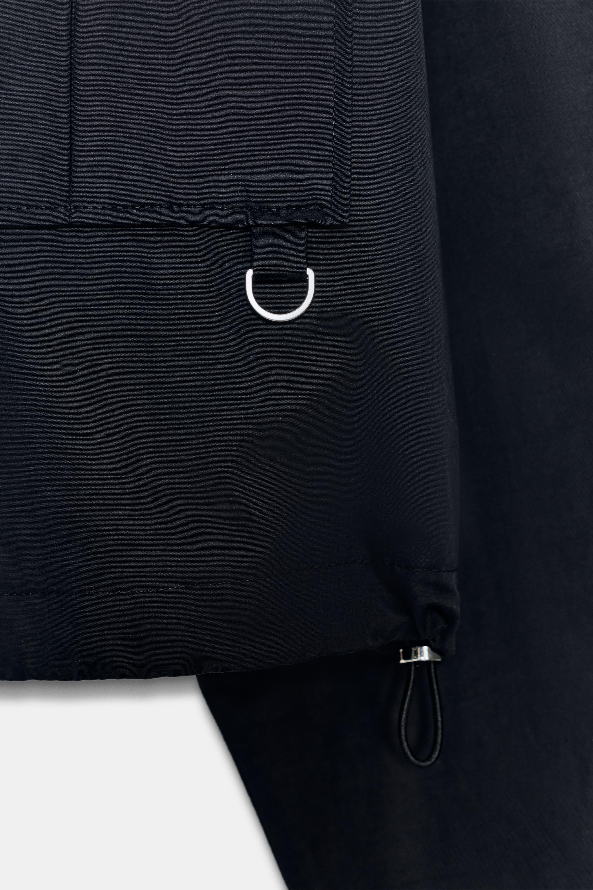 VESTE COURTE À COL MONTANT